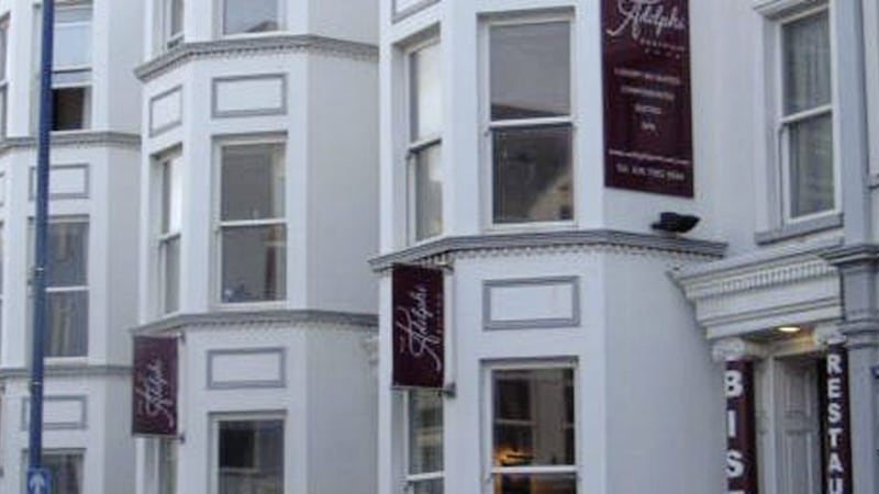 Minister Nichola Mallon has issued an opinion advising against the granting of planning permission for a three-storey extension to the Adelphi hotel in Portrush.