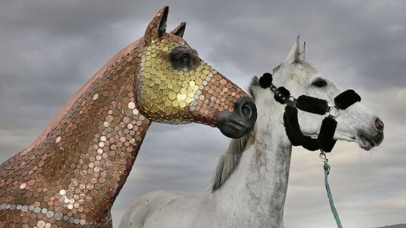 Artist, Marina Hamilton adorned the life-size sculpture with Euro and Sterling coins after riding her own horse, Six Silver Lane in three races. Picture by Margaret McLaughlin.  