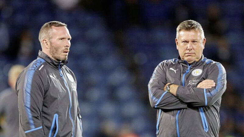 Leicester City former manager Craig Shakespeare (right) and caretaker boss Michael Appleton during the Premier League match at the King Power Stadium, Leicester.&nbsp;