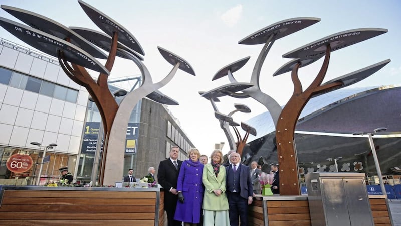 President Michael D Higgins, centre right, and his wife Sabina Coyne, centre left, with Julie Hamilton, centre, from Justice4the21, at the memorial to the victims of the Birmingham bombings on the first day of an official visit to Birmingham. Picture by Aaron Chown, Press Association 