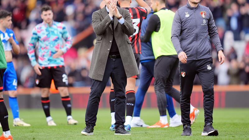 Bournemouth manager Andoni Iraola (centre) applauds the fans after victory over Brighton .