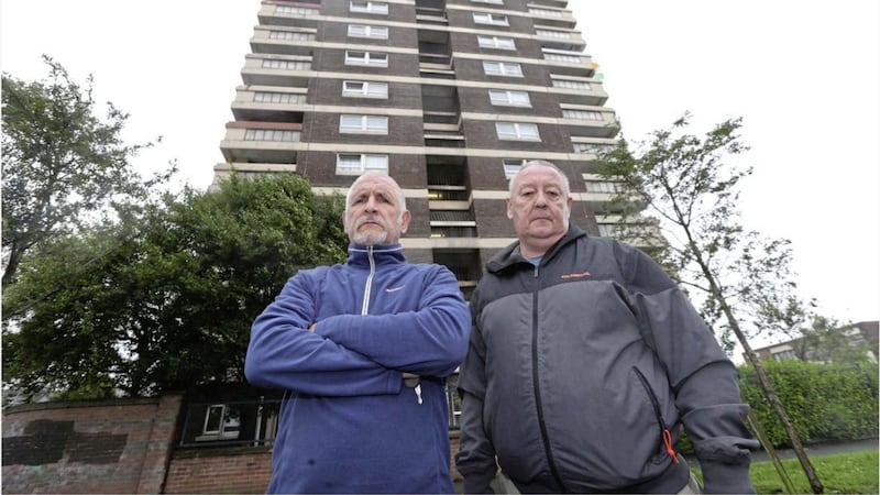North Belfast tower block residents Liam Seagh&aacute;n &Oacute; H-airmheadhaigh and Gerard Brophy. Picture by Hugh Russell. 