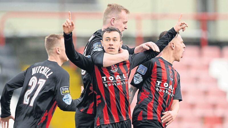 Paul Heatley was the man for Stephen Baxter&rsquo;s Crusaders side on Saturday as he bagged a second half double against Dungannon Swifts