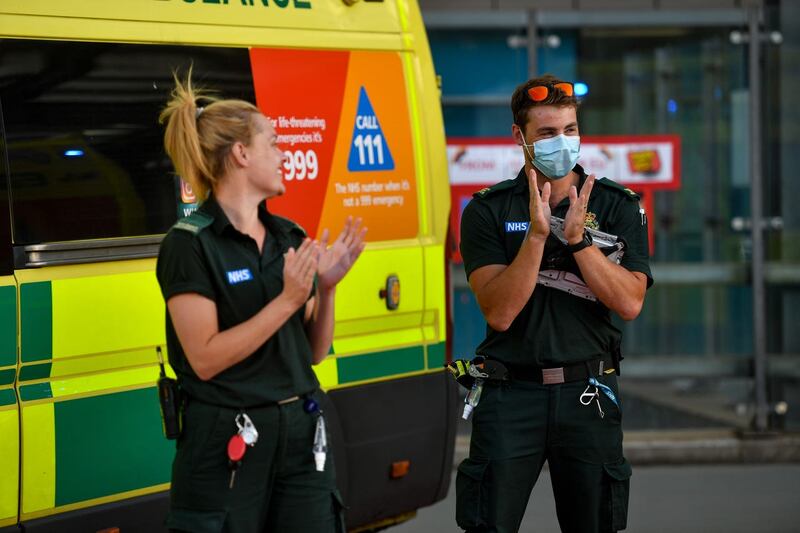 NHS staff also took part in the nationwide clapping ritual (Jacob King/PA)