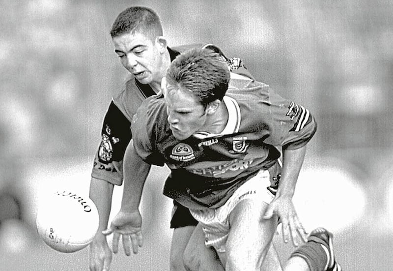 Down's Colm Murtagh and Mayo's Billy-Joe Padden in a race for possession during the 1999 All-Ireland Minor Final in Croke Park. Picture by Ann McManus.