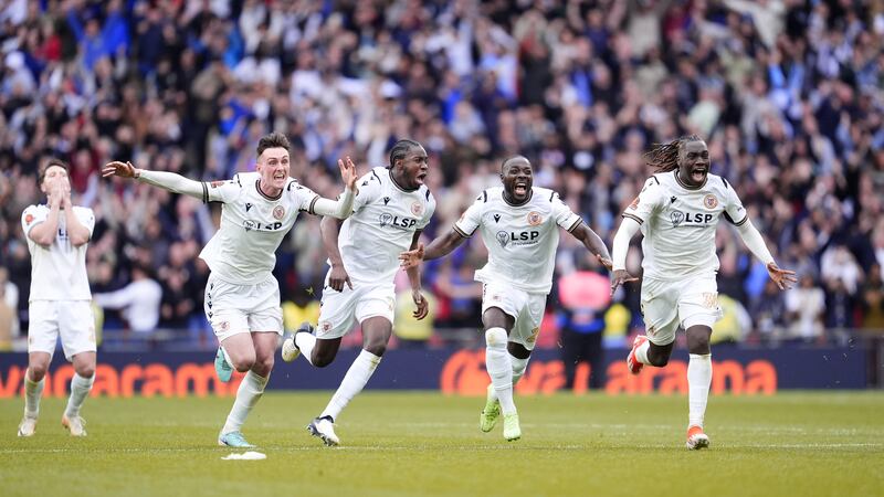 Bromley players celebrate winning the Vanarama National League play-off final against Solihull Moors at Wembley