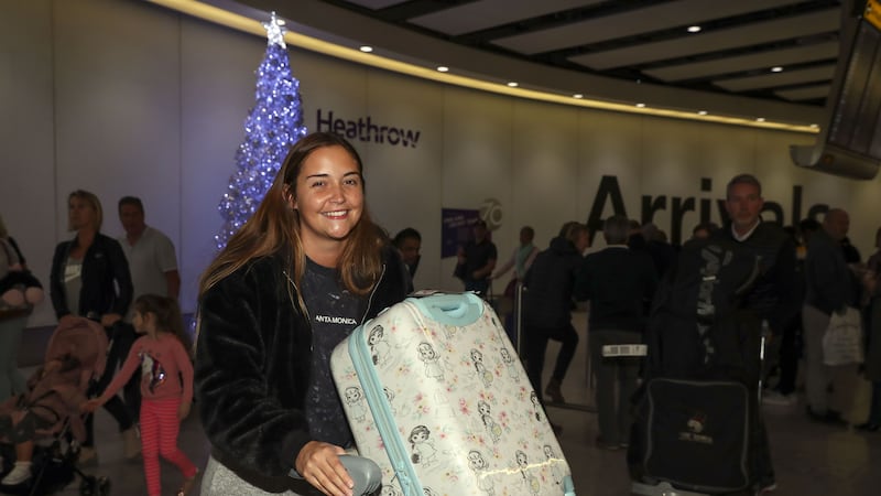 The former soap star was spotted with husband Dan Osborne at Heathrow Airport.