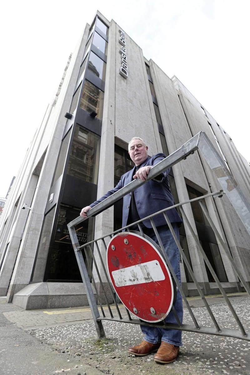 Ricky O'Rawe outside the former Northern Bank at Donegall Square West. Picture by Hugh Russell