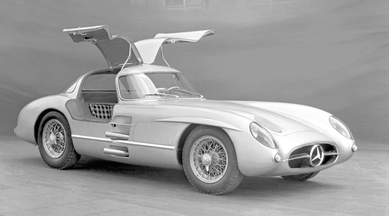 As with the more mechanically humble 300 SL, an unusual high-sided tubular frame chassis construction meant that normal doors could not be fitted, leading to the famous &#39;gullwing&#39; solution. 