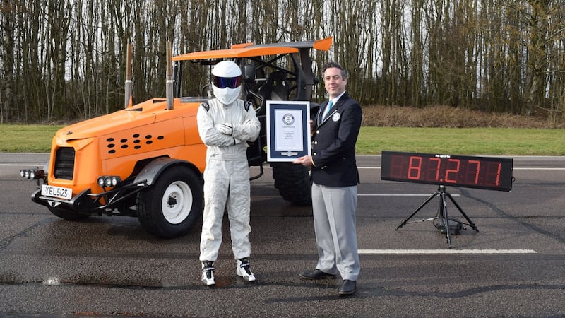 The driver took the Guinness World Record for Fastest Tractor.
