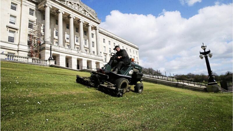 There might not be anything happening with the talks at Stormont over Easter, but at least the grass is getting cut. Picture by Hugh Russell. 