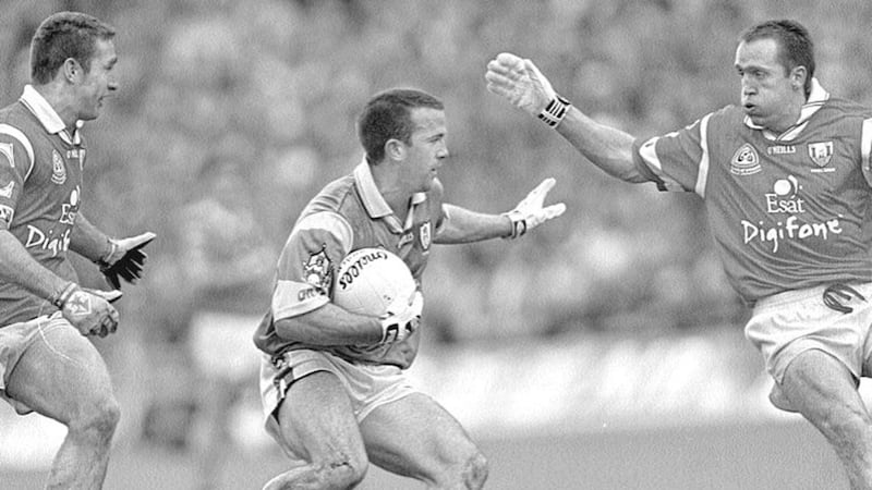 EVAN BETTER THAN THE REAL THING...Meath attacker Evan Kelly (left) attempts to sidestep Ciaran O&rsquo;Sullivan (right) during yesterday&rsquo;s All-Ireland football final 
