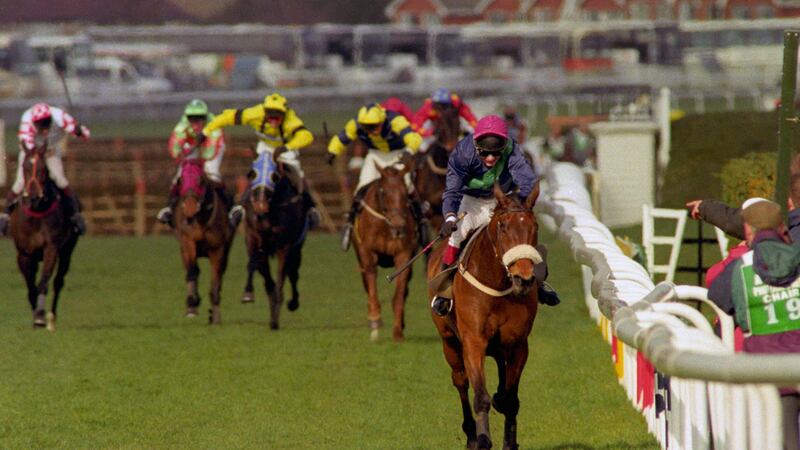 Mick Fitzgerald on Rough Quest as they go on to win the Martell Grand National at Aintree in Liverpool on March 30 1996