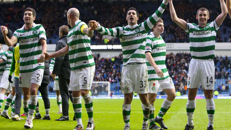 Celtic's Charlie Mulgrew, Daniel Majstorovic, Beram Kayal and Niall McGinn (left to right) celebrate after their 2-0 Clydesdale Bank Scottish Premier League win over Rangers at the Ibrox Stadium, Glasgow on Sunday January 2 2011. Georgios Samaras scored both Celtic goals, one from a penalty after he was brought down in the box