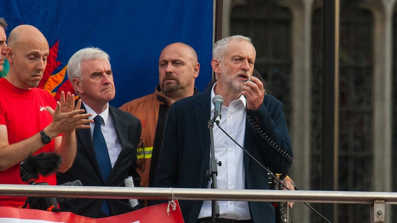 Labour leader Jeremy Corbyn speaks in Parliament Square, alongside Shadow Chancellor John McDonnell, second left, where the Momentum campaign group are holding a &quot;Keep Corbyn&quot; <br />demonstration. Picture by Dominic Lipinski, Press Association&nbsp;