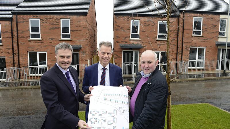 NEW HOMES: Paul Frew MLA for North Antrim with Michael McDonnell, group chief executive of Choice Housing and Ballymena councillor Reuben Glover at the official opening of the first phase of the &pound;8.5million Larne Road Development