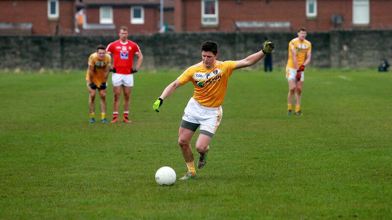 Tomas McCann kicks the equalising point against Louth at Corrigan Park on Sunday<br />Picture by Seamus Loughran &nbsp;