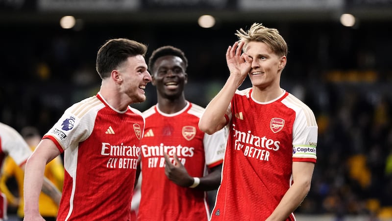 Arsenal’s Martin Odegaard celebrates his goal at Wolves