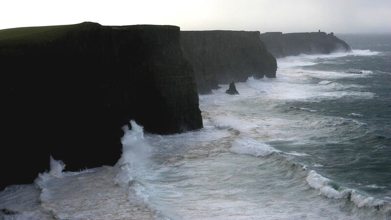 Waves crash on the Cliffs of Moher