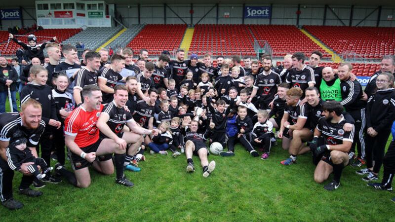 Kilcoo players celebrate after beating Burren to win their sixth successive Down SFC title at Pairc Esler yesterday. Picture by Cliff Donaldson&nbsp;