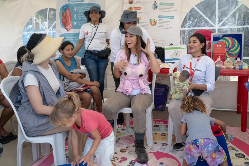 Myleene Klass joins mothers in a breastfeeding clinic run by the charity at La Pista informal settlement, La Guajira