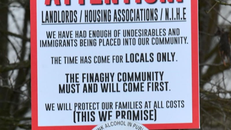 One of the anti-immigration signs in Finaghy which police are treating as a hate crime. PICTURE: MAL MCCANN