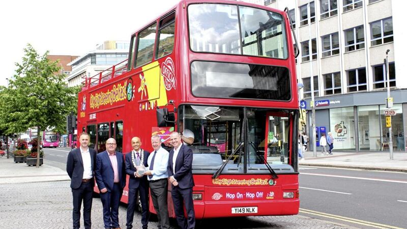 Pictured are: Jim Maguire, business development manager at CitySightseeing Belfast; Sean Slane, director, CitySightseeing Belfast; Rajesh Rana, president, Belfast Chamber; George Grimley, director, CitySightseeing Belfast; and Paul Cunningham, director, CitySightseeing Belfast. 