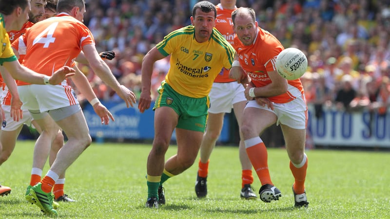 Armagh's Ciaran McKeever battling with Donegal's Frank McGlynn during last year's Ulster Championship &nbsp;