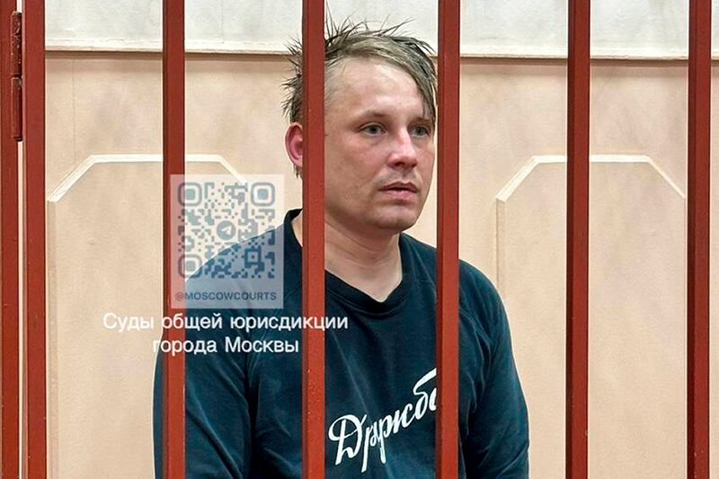 In this photo released by Basmanny District Court press service, Russian journalist Konstantin Gabov attends a hearing at a court in Moscow after his arrest on ‘extremism’ charges, which he denied (Basmanny District Court press service via AP)