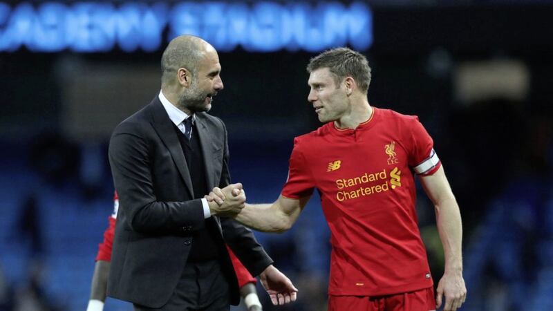 Manchester City manager Pep Guardiola shakes hands with Liverpool captain James Milner after yesterday&#39;s 1-1 draw at the Etihad Stadium 