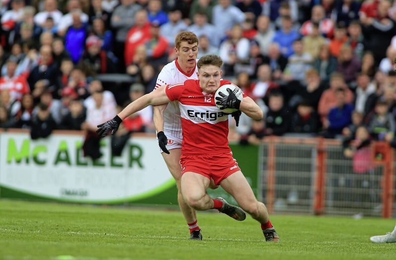 Derry&#39;s Ethan Doherty in action against Tyrone&#39;s Peter Harte in this year&#39;s Ulster SFC. The counties will clash again in the 2023 Bank of Ireland Dr McKenna Cup 