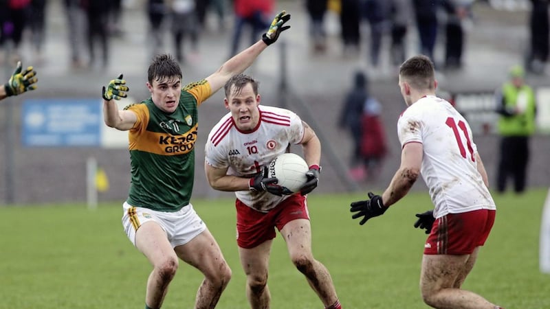 Tyrone&#39;s Kieran McGeary is put under pressure by Kerry&#39;s Sean O Shea in the 2020 Allianz Football Div 1 game at Healy Park in Omagh on Sunday February 9 2020. Picture by Seamus Loughran. 