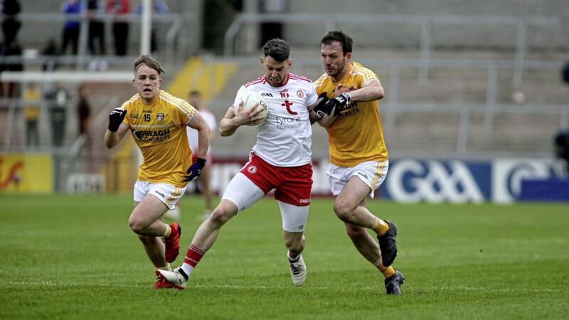 Tyrone&#39;s Mattie Donnelly takes on Antrim&#39;s Odhran Eastwood and Patrick Gallagher in Saturday night&#39;s quarter-final game at the Athletic Grounds. Picture: Seamus Loughran. 