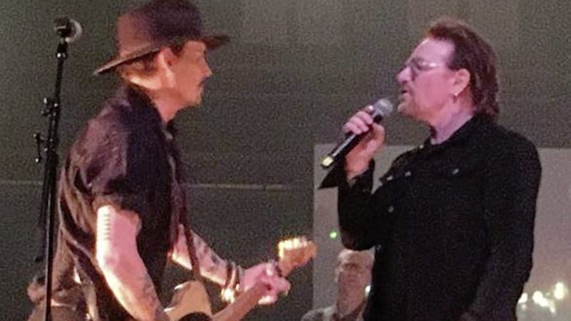 Johnny Depp was snapped rehearsing The Pogues tune A Rainy Night in Soho with U2&#39;s Bono in the lead up to the gig 