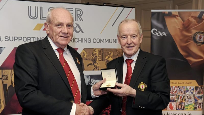 Oliver Galligan (left) takes over the Ulster GAA presidency from Michael Hasson (right) 