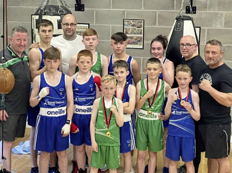 Coaches Mark Kelly, Dee Jardine, Robert Fisher and Dafydd Carlin with the Holy Trinity squad before a recent show at Banbridge Boxing Club   