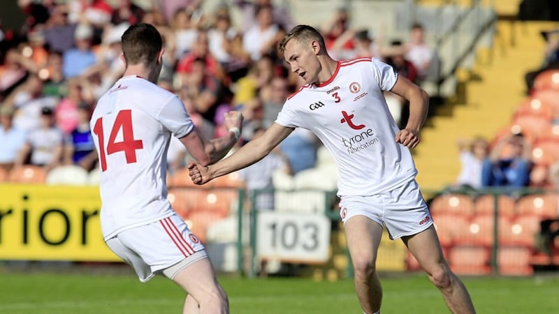 Tyrone&#39;s Conor Quinn celebrates his goal with Sean Og McAleer during the 2019 Eirgrid Ulster Under 20 Football Championship final between against Derry. Picture by Philip Walsh. 