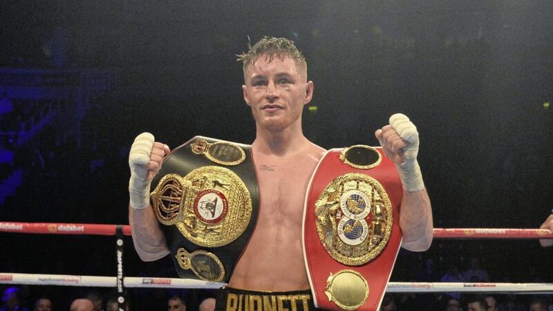 Ryan Burnett celebrates after beating Zhanat Zhakiyanov to become two-time World champion at the SSE Arena in Belfast on Saturday evening. Picture by Colm Lenaghan, Pacemaker  