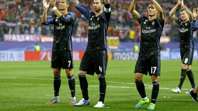 Real Madrid players salute their fans after last night&#39;s Madrid derby clash 