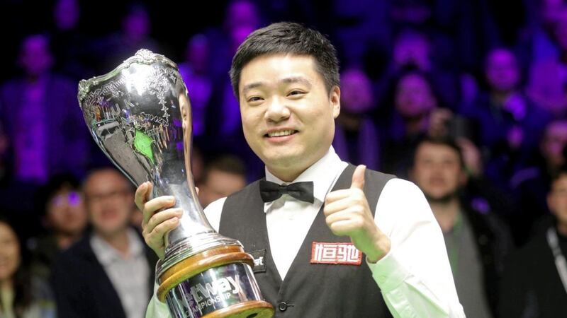 Ding Junhui celebrates after winning the Betway UK Championship at the York Barbican. 