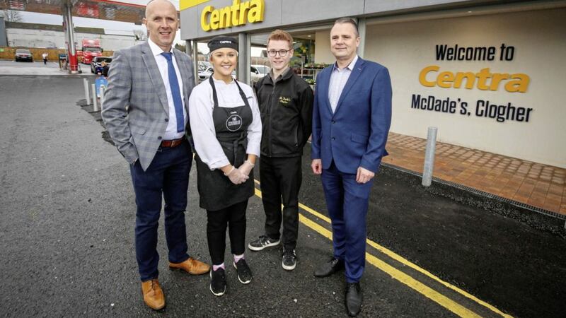 Centra Clogher store owner John McDade (left) and regional manager Austin McGrath (right) with members of the Centra Clogher team. Photo: Matt Mackey/PressEye 