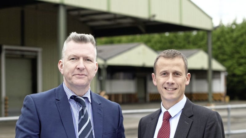 Pictured at the site of the former Coke plant in Lisburn is Mark Robinson, group commercial director and Roger Pannell, managing director of Unicorn Group, who have purchased the site in a multi-million pound deal 