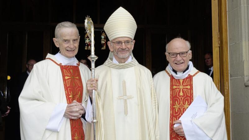 The Bishop of Raphoe, Alan McGuckian, with his two brothers, Fr Michael McGuckian SJ (left) and Fr Bernard McGuckian SJ at his ordination last week. Picture by Liam McArdle 