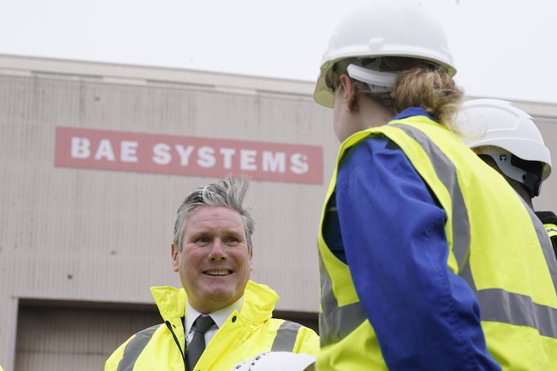 Labour Party leader Sir Keir Starmer talking to workers