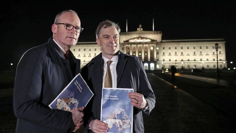 Simon Coveney and Julian Smith unveil the New Decade New Approach agreement. Picture by Niall Carson/PA Wire 