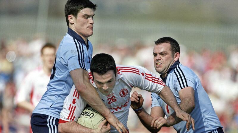 Paul Casey (right) and Diarmuid Connolly get to grips with Tyrone&#39;s Ryan Mellon. Casey says Connolly was one of his toughest opponents, purely from their training encounters. Picture by Seamus Loughran 