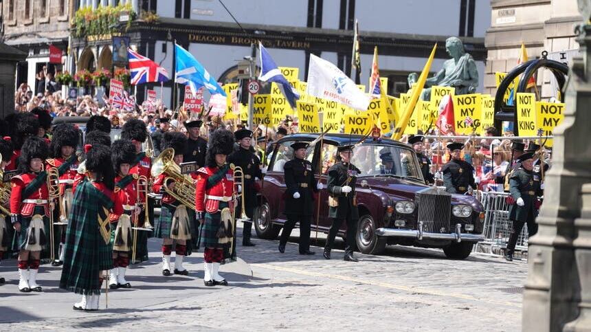 Protesters were on the Royal Mile as the King made his way to St Giles’ Cathedral (Danny Lawson/PA)