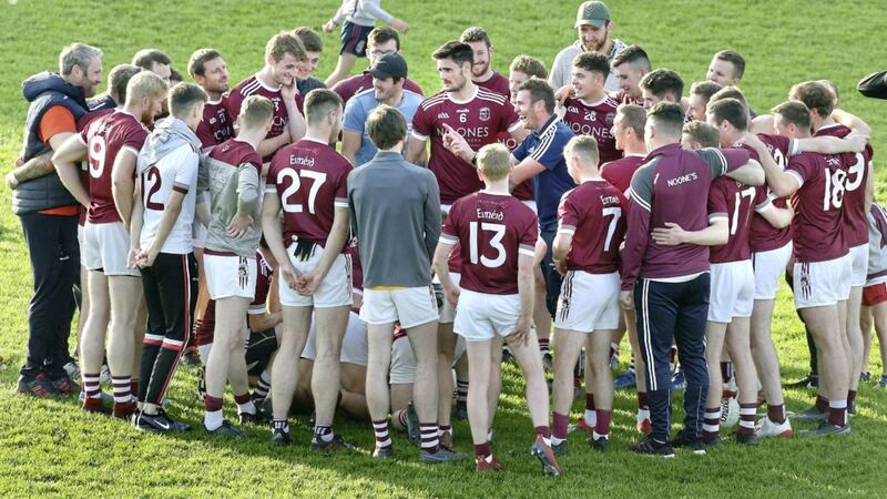 Slaughtneil manager Paul Bradley with the team after beating Glen during the Derry Senior Football Championship quarter final at Celtic Park on Sunday. Picture by Margaret McLaughlin 