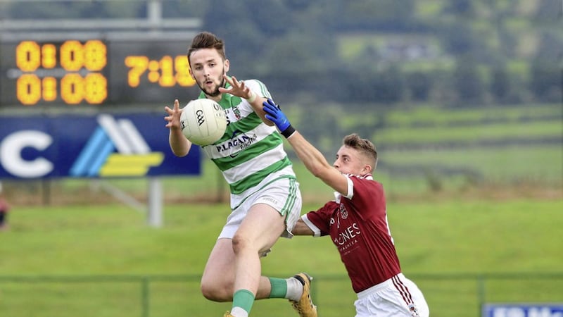 Slaughtneil&#39;s Keelan Feeney with Patrick Kearney of Swatragh during the Derry Senior Football Championship match at Owenbeg on Sunday Picture by Margaret McLaughlin 