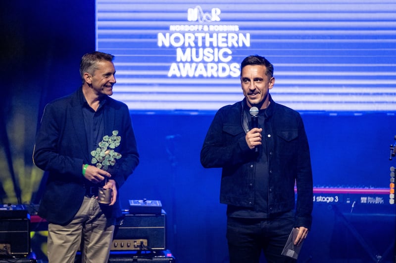 Gary Neville presents the best band award to The Courteeners at the first Nordoff and Robbins Northern Music Awards